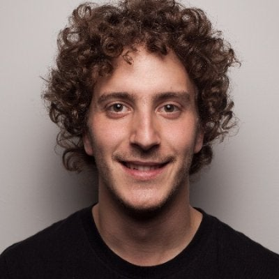 LinuxKit as a Commodity for Building Linux Distributions